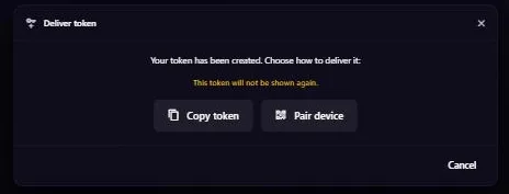 The Deliver token dialog: a warning that the token will not be shown again, and two buttons, Copy token and Pair device.